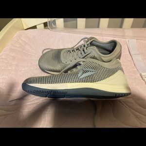 Never worn. Size 7 women’s CrossFit Reebok Nanos.